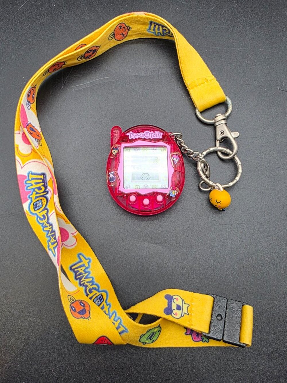 Tamagotchi Connection Translucent Pink lanyard included new battery